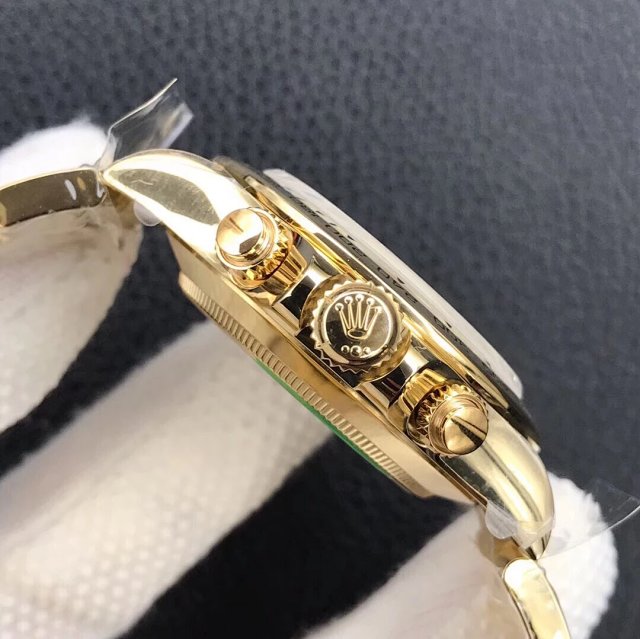 Replika Rolex Daytona Sarı Altın Kronograf Butonları